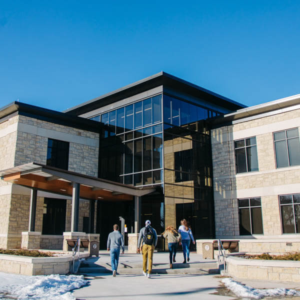 Students walking into the Center for Applied Technology