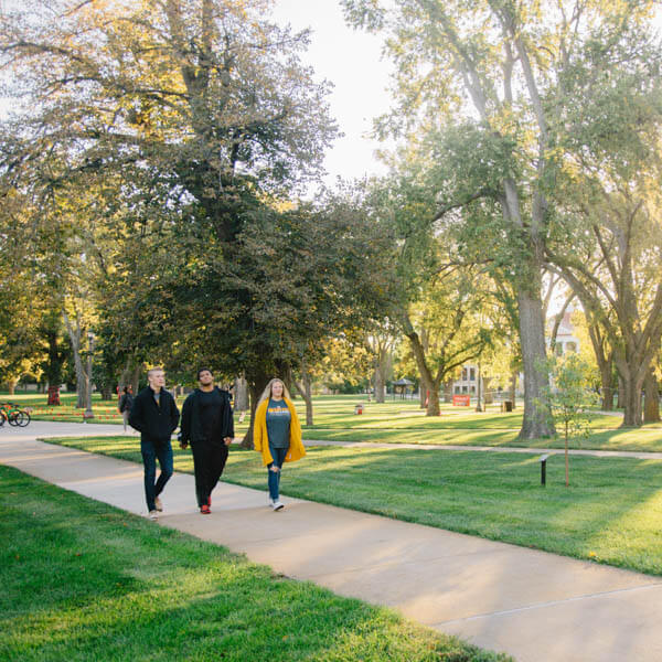 students walking through the quad