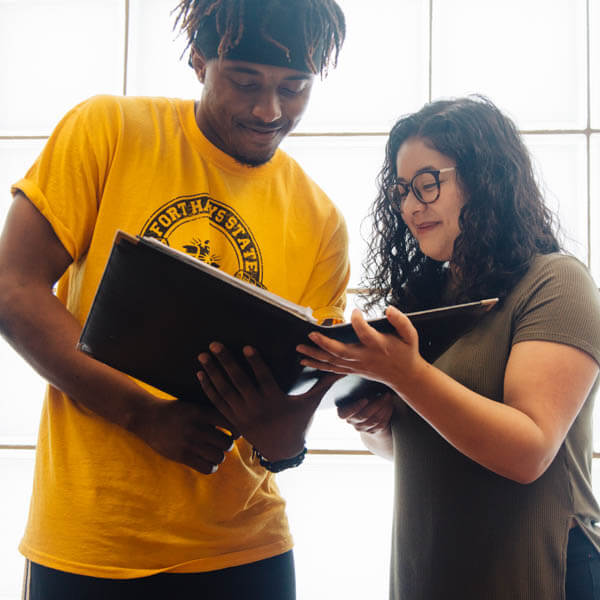 two students discussing something