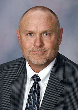 headshot of Kim Stewart