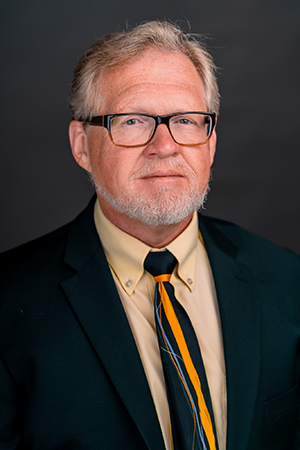 headshot of Paul Adams