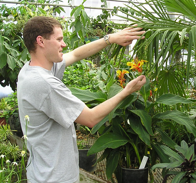 Brian Maricle in greenhouse