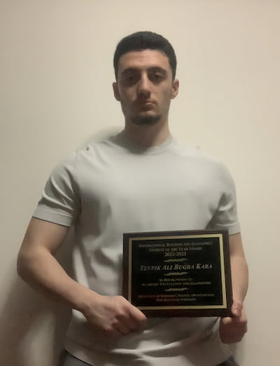 Tevik Ali Bugra Kara with Plaque