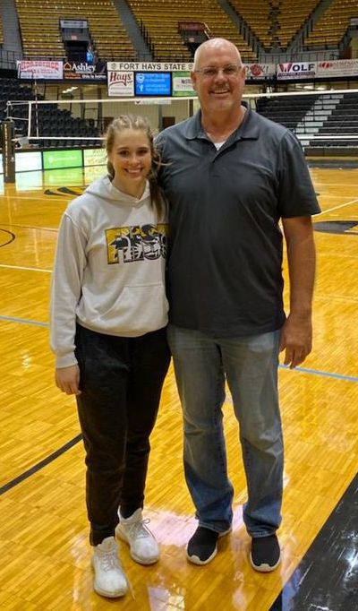0) FHSU volleyball player Madi Miller, left, always has time for her dad, former Tiger football player Jeff Miller, after a match.
