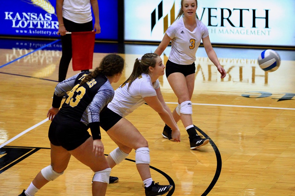 3) Madi Miller passes the ball to a teammate in a match earlier this season.