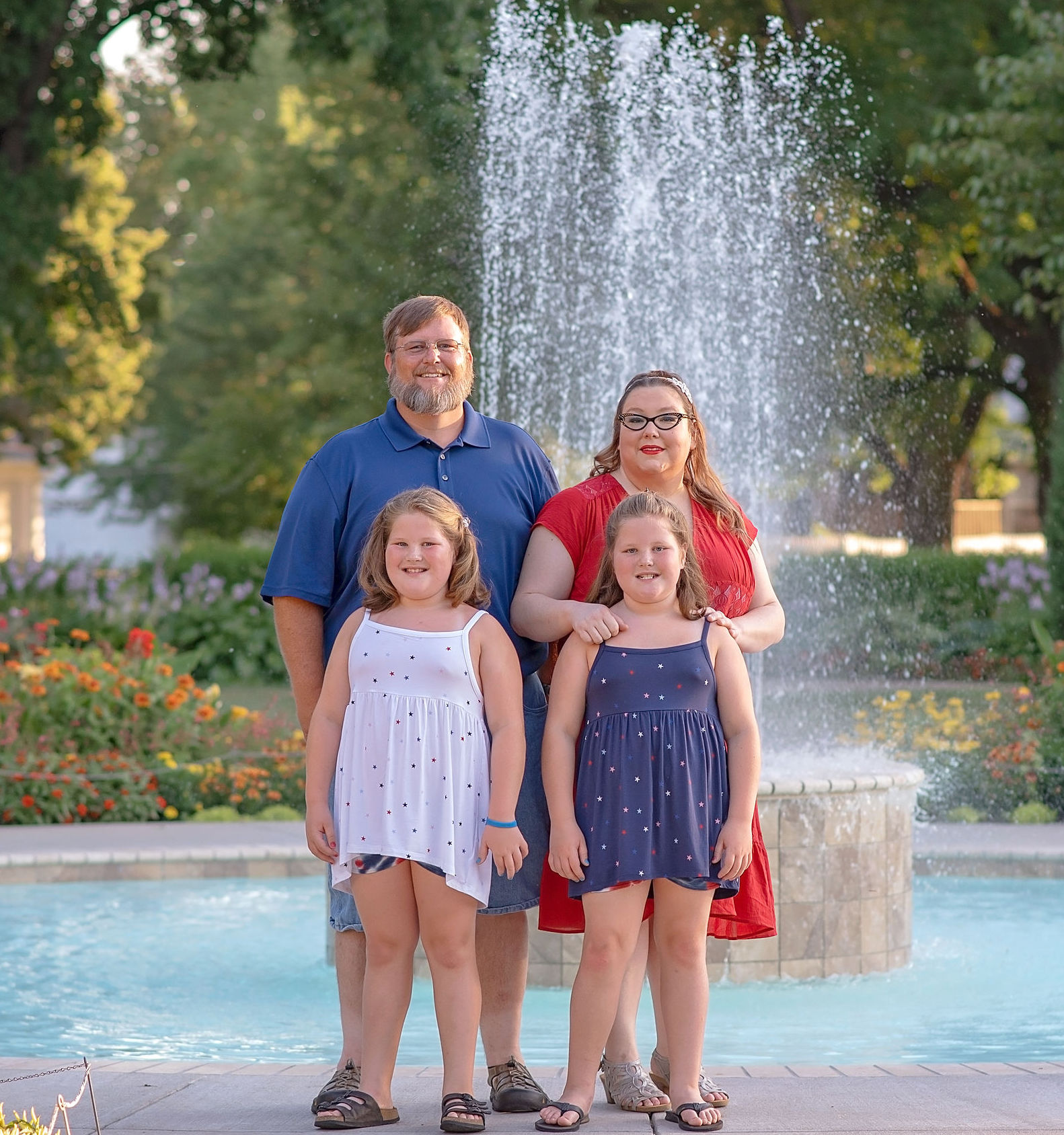 Christy Rothchild pictured with her husband, Brent, and their twin daughters.