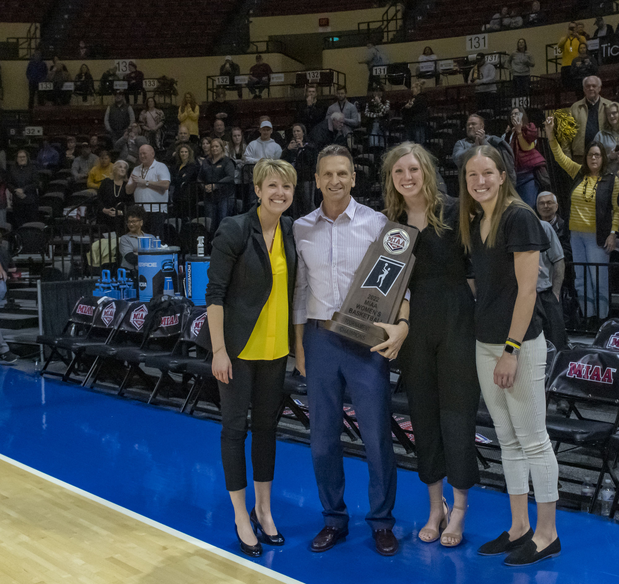 FHSU’s winning coaching staff, from left, are assistant Talia Kahrs, head coach Tony Hobson, assistant Paige Lunsford, and graduate student Kacey Kennett. Photo by Bob Duffy