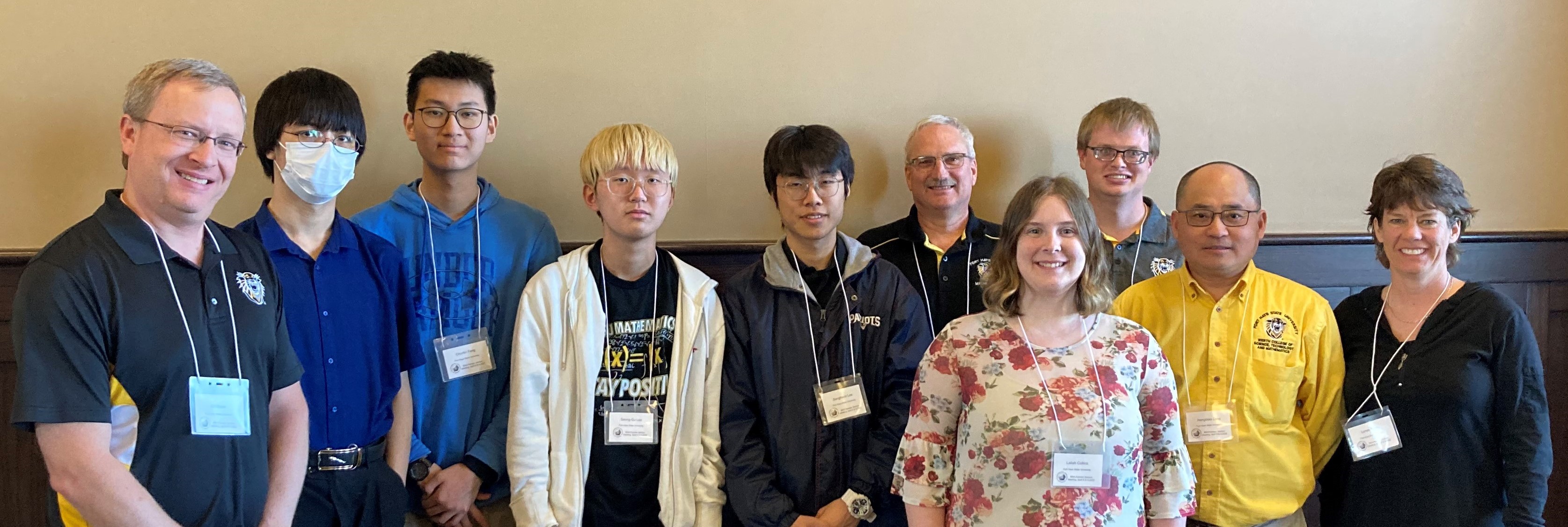 From left, Dr. Bill Weber, Peilin Zhang, Chunlin Feng, Seung Gu Lee, Sanghoon Lee, Dr. Keith Dreiling, Lailah Collins, Dr. Paul Flesher, Dr. Hongbiao Zeng, Dr. Lanee Young.