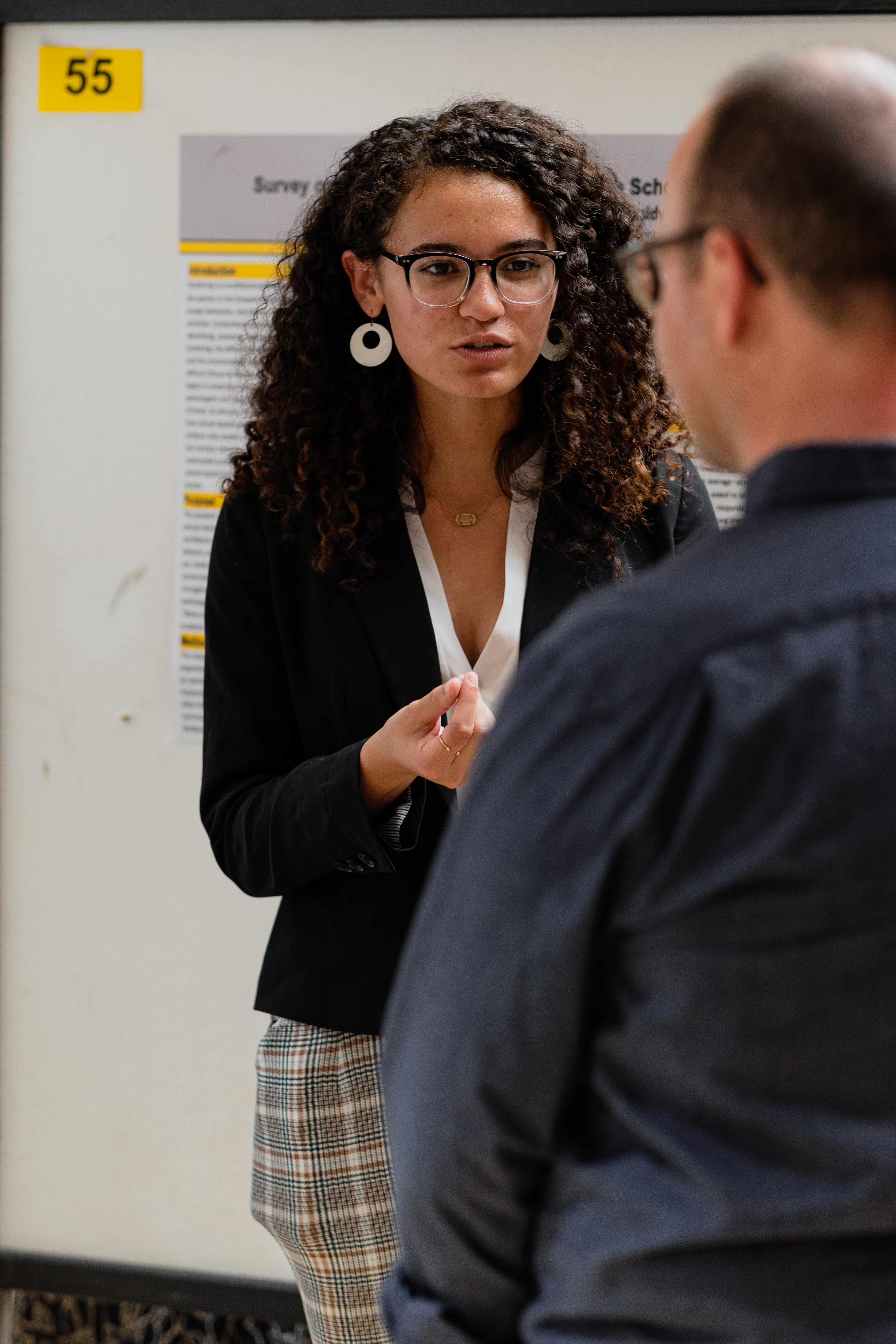FHSU student Kadrian Ayarza discussing her empirical research titled "RNA Isolation of Aphids."