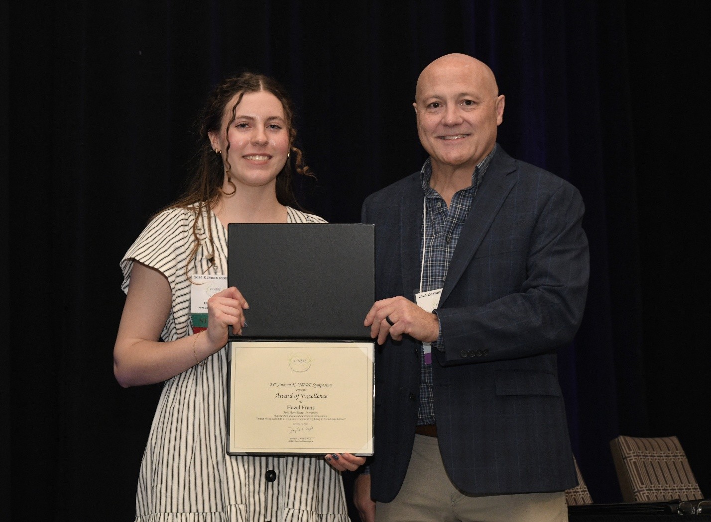 Hazel Frans, Oral Presentation Winner, pictured with Dr. John Stanford of Kansas School of Medicine