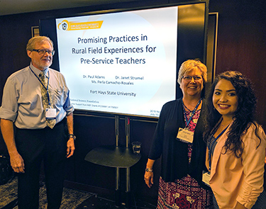 Dr. Paul Adams, Dr. Janet Stramel and Liberal senior Perla Camacho-Rosales