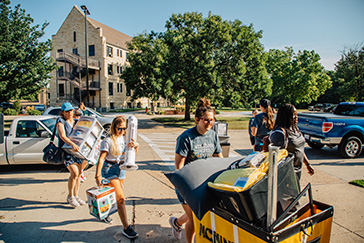Students moving their belongings into their FHSU home.